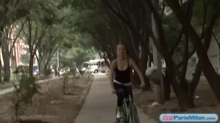 Busty solo teen riding her bike through the park